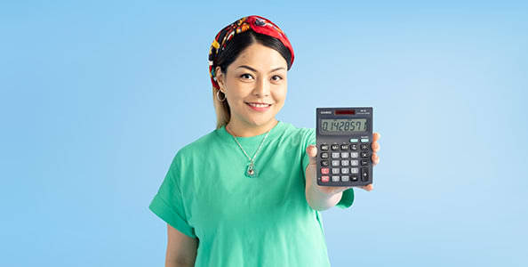 woman holding a calculator